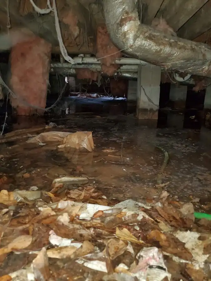 Crawl space flood assessment for Commercial Water Damage Restoration in Mason City